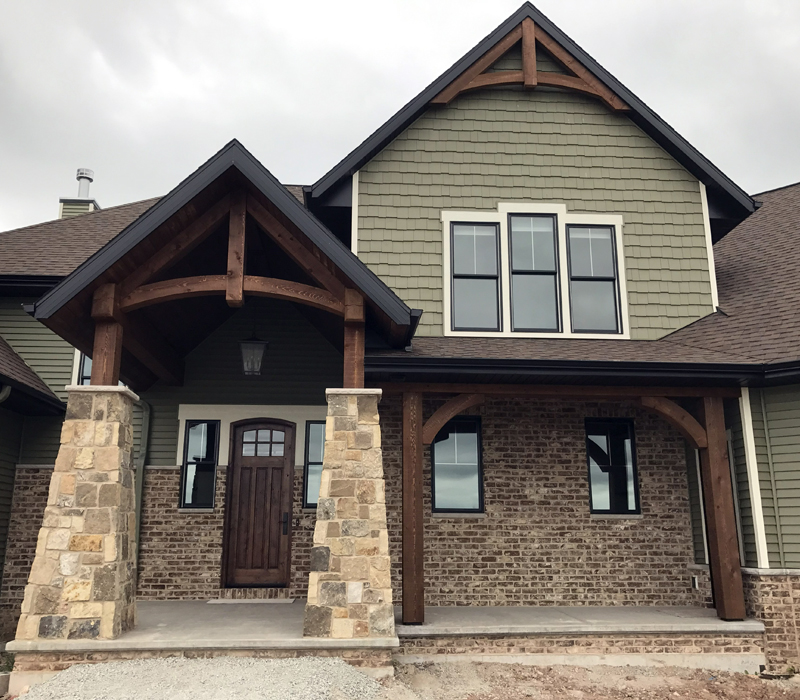 Front view of home with three garages